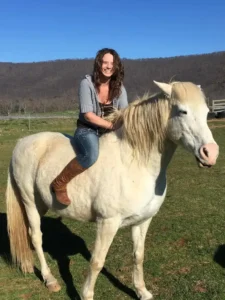 Brittany riding her horse Jerry Lee bareback